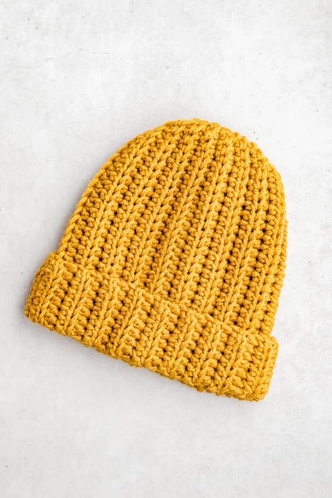 the finish crochet winter hat with a folded brim and stretchy knit-look ribbing stitch