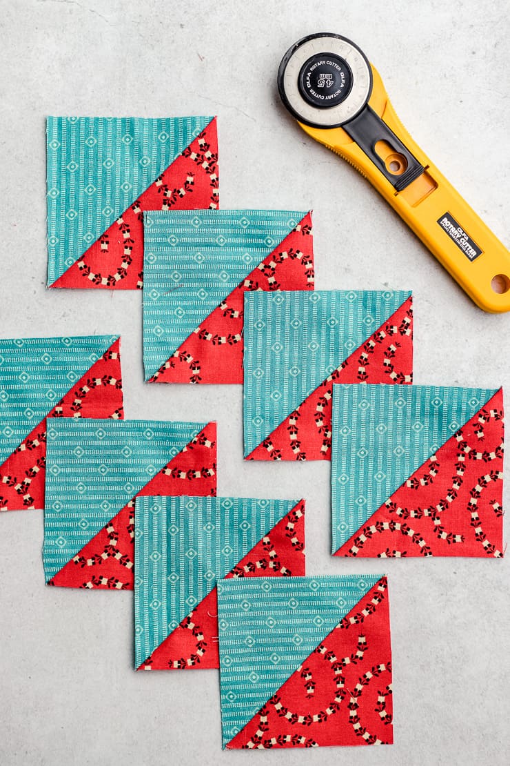 8 teal and red half-square triangles made with the Magic 8 hst method