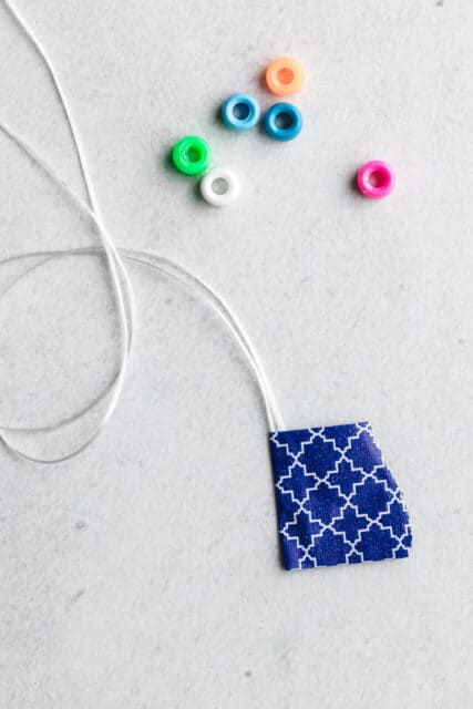 How to Make Stretchy Beaded Bracelets with Elastic Cord - Sarah Maker