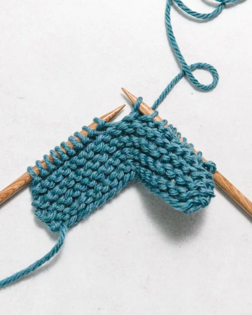 How to Knit the Knit Stitch (k) for Beginners - Sarah Maker