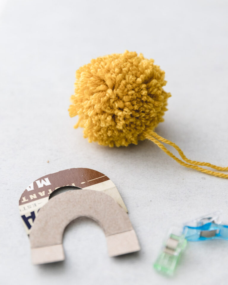 How to Make a Yarn Pom Pom with a Free Cardboard Template - Sarah Maker
